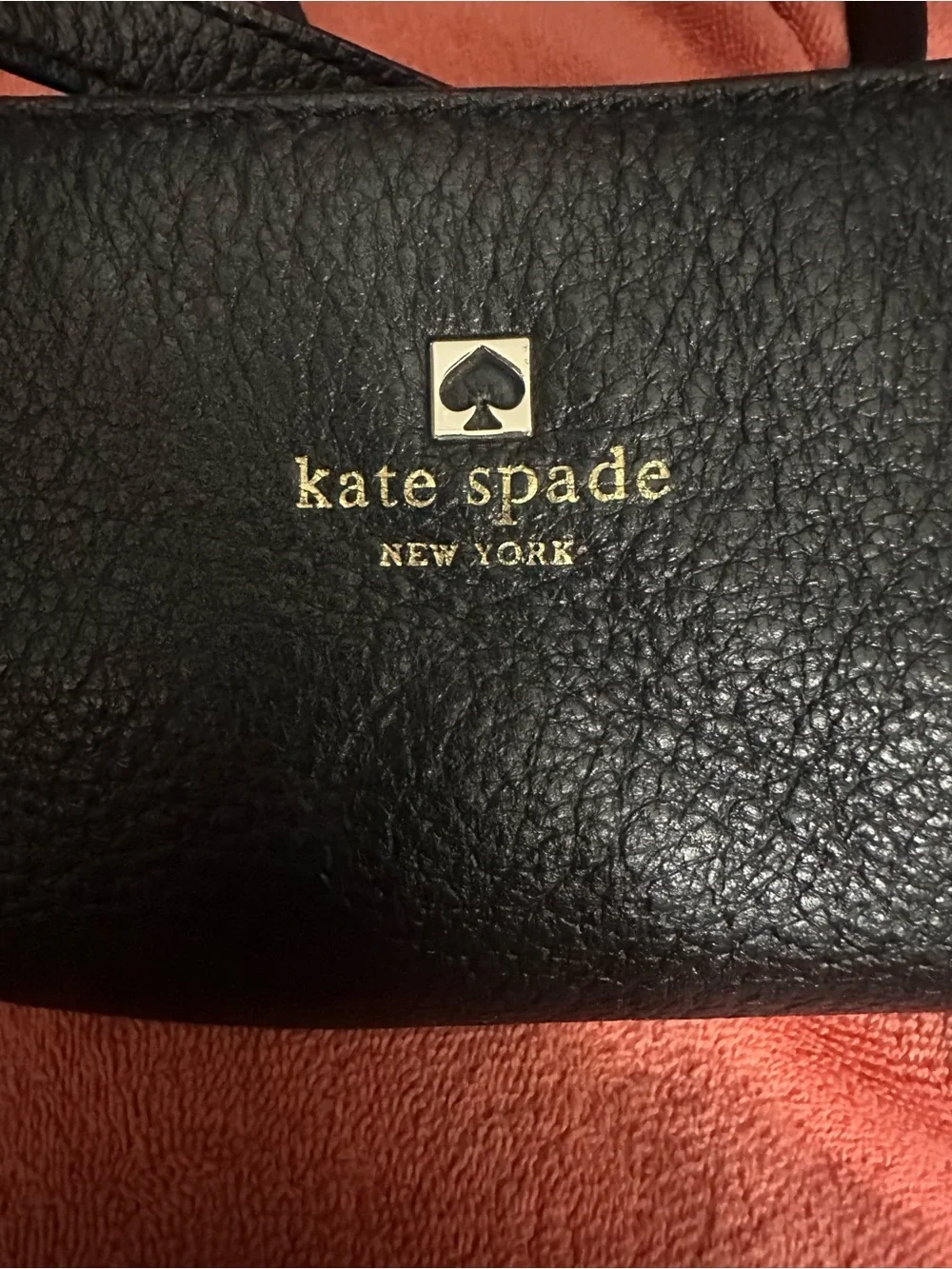 kate spade black pebbled leather crossbody with gold logo